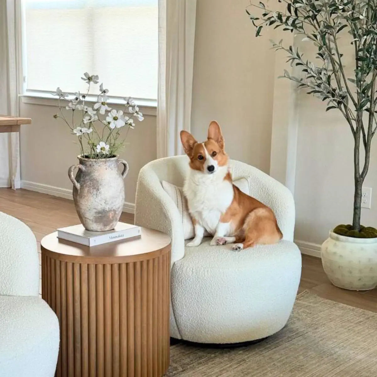 Årcla Boucle Swivel Barrel Chair